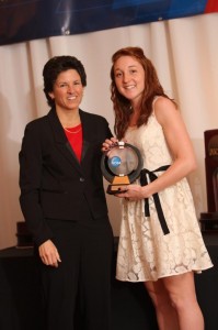 Marah Sobczak accepts the Elite 89 Award from NCAA Assistant Diector of Championships Jan Gentry at NCAA Championship banquet. Photo courtesy of Ken at HuthPhoto.com