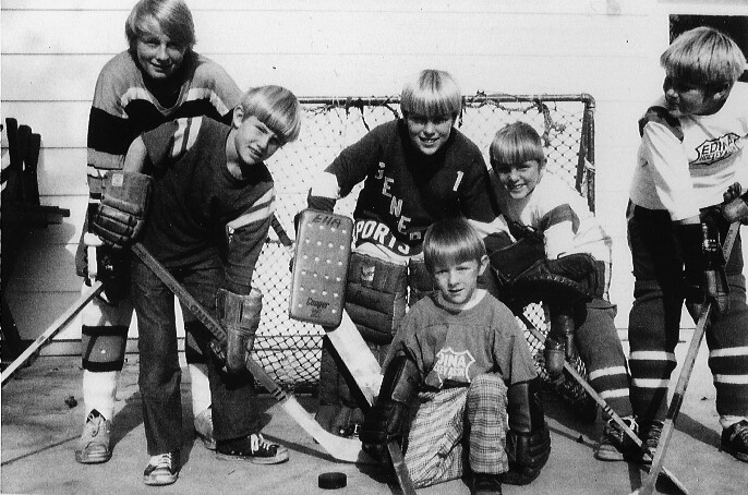 The Carroll boys in their Edina hockey jerseys.